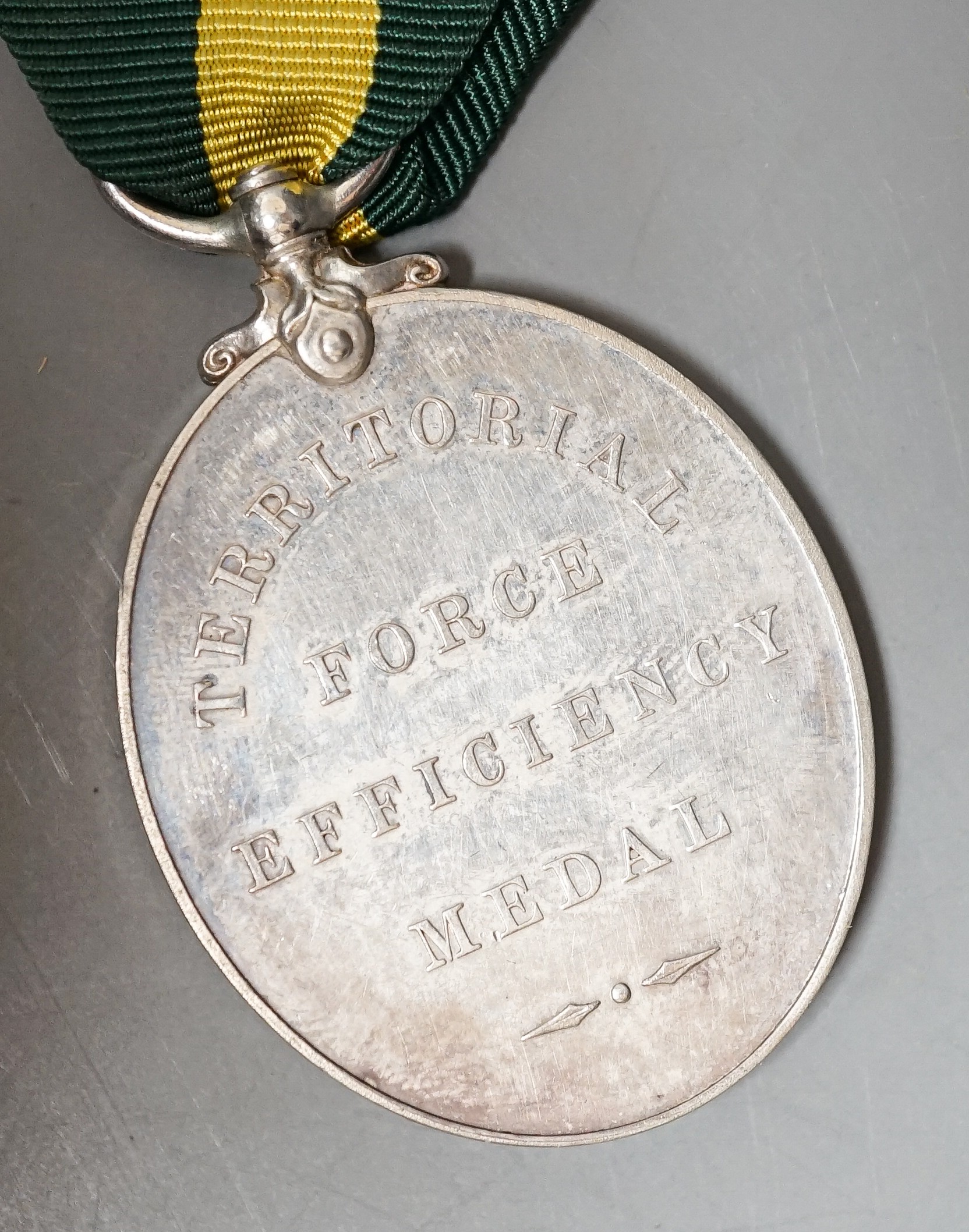 Six military associated medals to include - QSA with four clasps to 184 PTE. T. GRIFFITHS C.I.V., George V Territorial Force Efficiency Medal to 314 SJT. E.H. BARTON 25/ CYC.BN. LOND. REGT. (25th County of London Cyclist